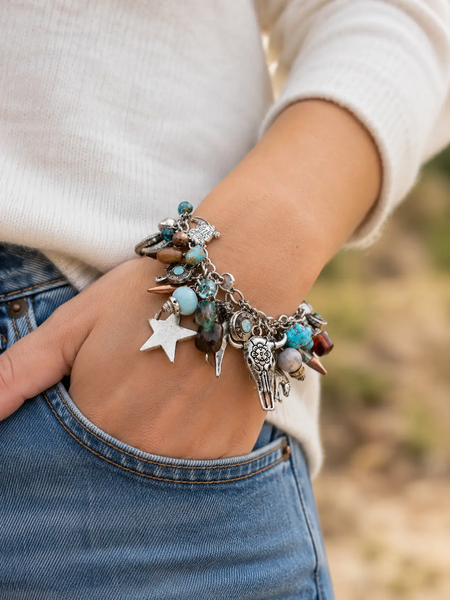 Wild Wild West Bullet Charm Bracelet with 37 charms, 14 reversible bullet charms